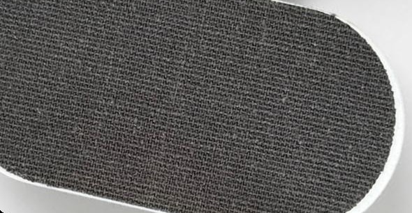 Close-up of a single black VITAL mouth tape strip